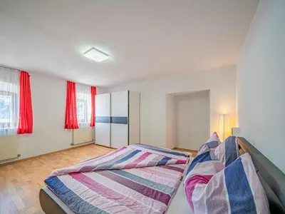 Ein Bett oder Betten in einem Zimmer der Unterkunft Apartement am Lift XL