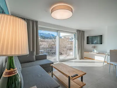 Ein Sitzbereich in der Unterkunft Apartement am Lift XL