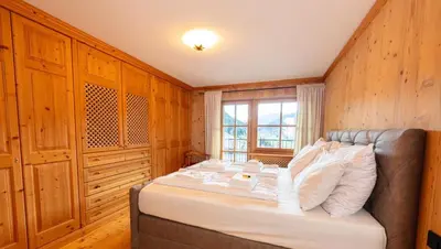 Ein Bett oder Betten in einem Zimmer der Unterkunft Das Kitz - deLuxe ChaletApartments