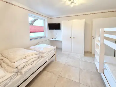 Ein Bett oder Betten in einem Zimmer der Unterkunft Hochgugg - Panorama Residenz
