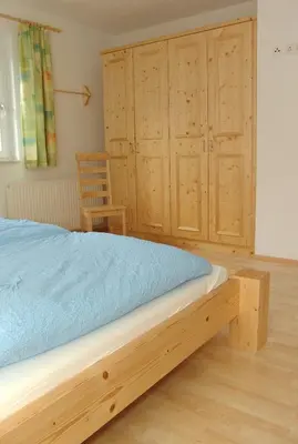 Ein Bett oder Betten in einem Zimmer der Unterkunft Ferienhaus Enterberg
