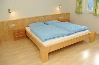 Ein Bett oder Betten in einem Zimmer der Unterkunft Ferienhaus Enterberg