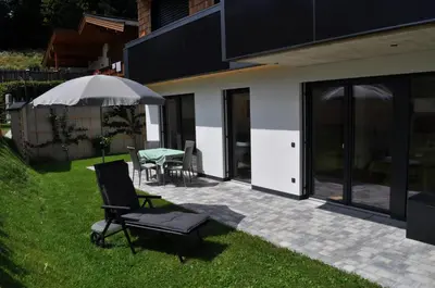 Ein Garten an der Unterkunft Haus am Walde