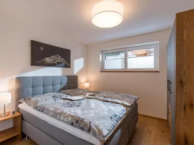 Ein Bett oder Betten in einem Zimmer der Unterkunft Haus am Walde