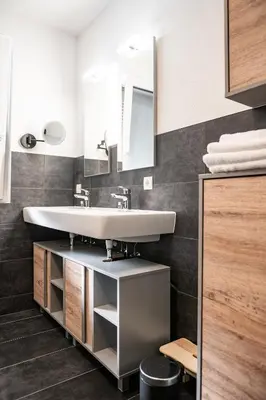 Ein Badezimmer in der Unterkunft Apartment Griass di Fügen