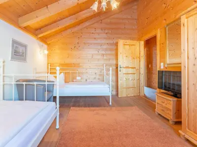 Ein Bett oder Betten in einem Zimmer der Unterkunft Chalet Wildschönau