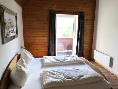 Ein Bett oder Betten in einem Zimmer der Unterkunft Alpen Chalet Bramberg