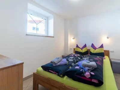 Ein Bett oder Betten in einem Zimmer der Unterkunft Apartment in Hollersbach near Ski Lift