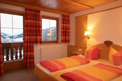 Ein Bett oder Betten in einem Zimmer der Unterkunft Ferienwohnung Schatzberg Panorama WILD445
