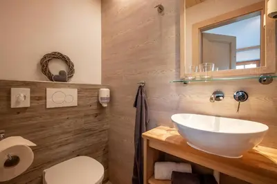 Ein Badezimmer in der Unterkunft Pension Edelweiss