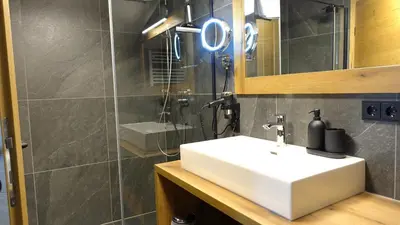 Ein Badezimmer in der Unterkunft BERGZEIT Appartements