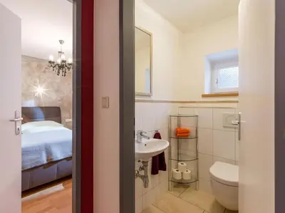 Ein Badezimmer in der Unterkunft abacus-Ferienwohnung