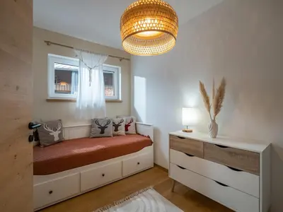 Ein Bett oder Betten in einem Zimmer der Unterkunft Ferienwohnung 