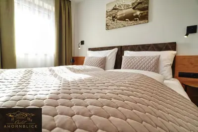 Ein Bett oder Betten in einem Zimmer der Unterkunft Chalet Ahornblick