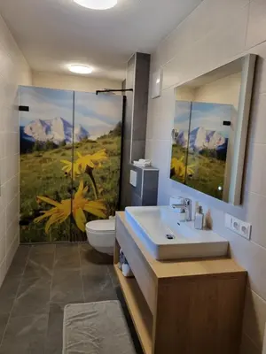 Ein Badezimmer in der Unterkunft Greidlhof Alpstyle Apartments