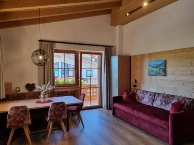 Ein Sitzbereich in der Unterkunft Greidlhof Alpstyle Apartments