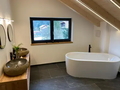 Ein Badezimmer in der Unterkunft Our's Living Penthouse - private Sauna - near Kitzbüheler Alpen ski lift