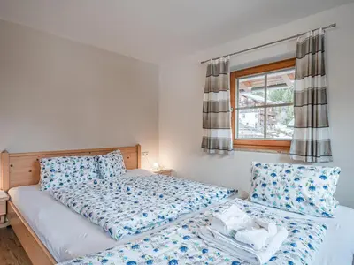 Ein Bett oder Betten in einem Zimmer der Unterkunft Brandtner Bauer