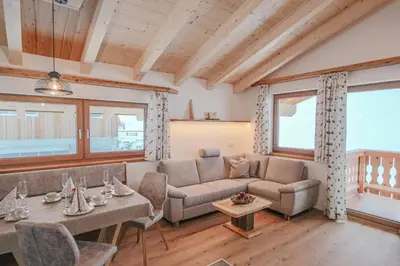 Ein Sitzbereich in der Unterkunft Bamerhof Haus Steger