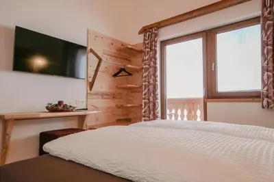 Ein Bett oder Betten in einem Zimmer der Unterkunft Bamerhof Haus Steger