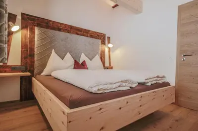 Ein Bett oder Betten in einem Zimmer der Unterkunft Bamerhof Haus Steger