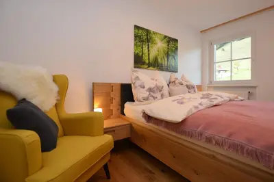 Ein Bett oder Betten in einem Zimmer der Unterkunft BERGapart Götschl Rettenschöss