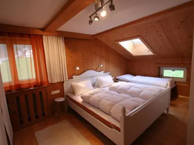 Ein Bett oder Betten in einem Zimmer der Unterkunft Chalet in Hopfgarten near Ski Lift