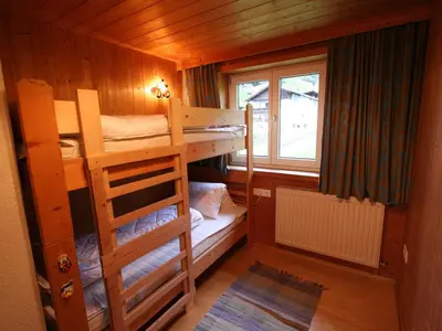 Ein Bett oder Betten in einem Zimmer der Unterkunft Chalet in Hopfgarten near Ski Lift