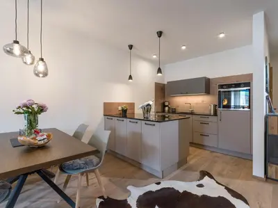 Küche/Küchenzeile in der Unterkunft Apartment Liebelei am See - Traumblick aufs Kaisergebirge - nur ein Katzensprung zum See