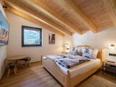 Ein Bett oder Betten in einem Zimmer der Unterkunft Apart Plan B