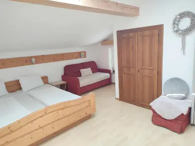 Ein Bett oder Betten in einem Zimmer der Unterkunft Haus Enzian