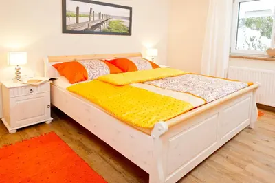Ein Bett oder Betten in einem Zimmer der Unterkunft Landhaus Montana