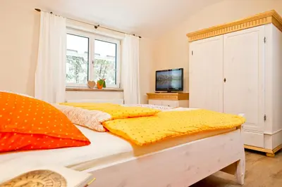 Ein Bett oder Betten in einem Zimmer der Unterkunft Landhaus Montana