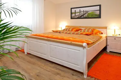 Ein Bett oder Betten in einem Zimmer der Unterkunft Landhaus Montana