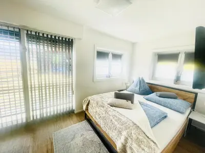 Ein Bett oder Betten in einem Zimmer der Unterkunft Apartment WEITBLICK