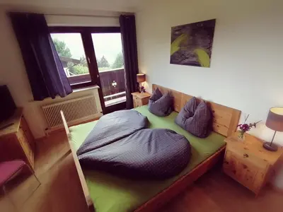 Ein Bett oder Betten in einem Zimmer der Unterkunft Ferienwohnung Oberkofler