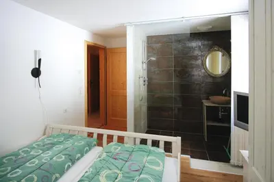 Ein Bett oder Betten in einem Zimmer der Unterkunft Chalet in Königsleiten with Wellness & Alps View