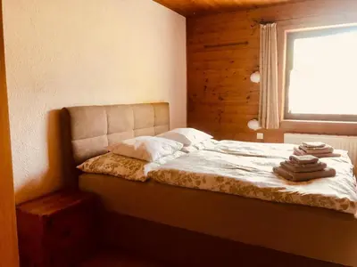 Ein Bett oder Betten in einem Zimmer der Unterkunft Ferienhaus Ella