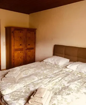 Ein Bett oder Betten in einem Zimmer der Unterkunft Ferienhaus Ella
