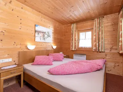 Ein Bett oder Betten in einem Zimmer der Unterkunft Holiday Home Lindenalm by Interhome