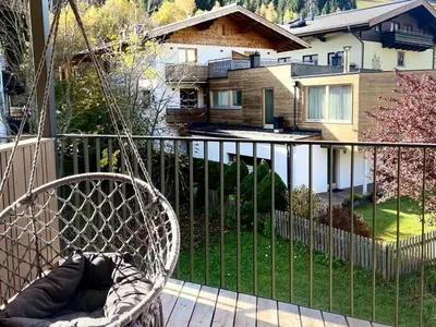Ein Garten an der Unterkunft Bergzeit Apartments right on the ski slope