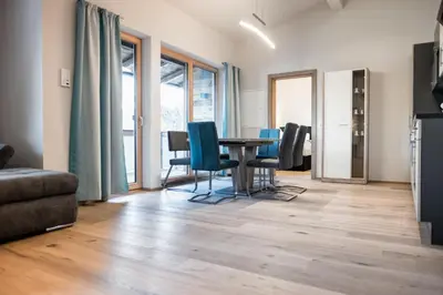 Ein Sitzbereich in der Unterkunft Center Penthouse Hollersbach Top 10 by Alpina-Holiday