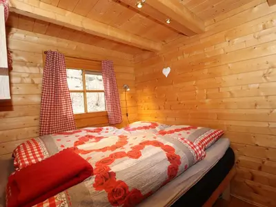 Ein Bett oder Betten in einem Zimmer der Unterkunft Kogelnig-Hütte