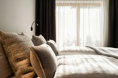 Ein Bett oder Betten in einem Zimmer der Unterkunft Hohe Tauern Lofts Panoramabahn by Alpina-Holiday