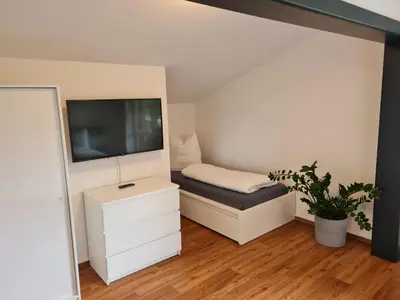 Ein Bett oder Betten in einem Zimmer der Unterkunft Ferienwohnung Zauberwinkelweg mit Traum-Aussicht!