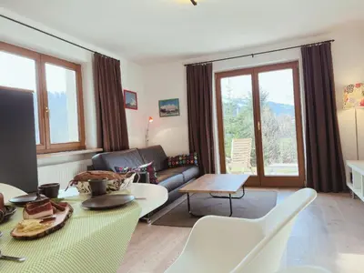 Ein Sitzbereich in der Unterkunft Appartements Skida