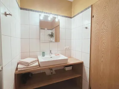 Ein Badezimmer in der Unterkunft Appartements Skida