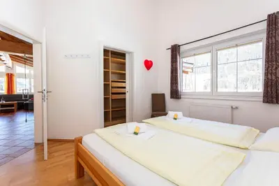 Ein Bett oder Betten in einem Zimmer der Unterkunft Chalet Habachtal - Wildkogel