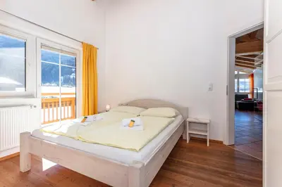 Ein Bett oder Betten in einem Zimmer der Unterkunft Chalet Habachtal - Wildkogel