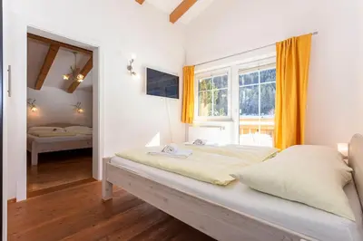 Ein Bett oder Betten in einem Zimmer der Unterkunft Chalet Habachtal - Wildkogel